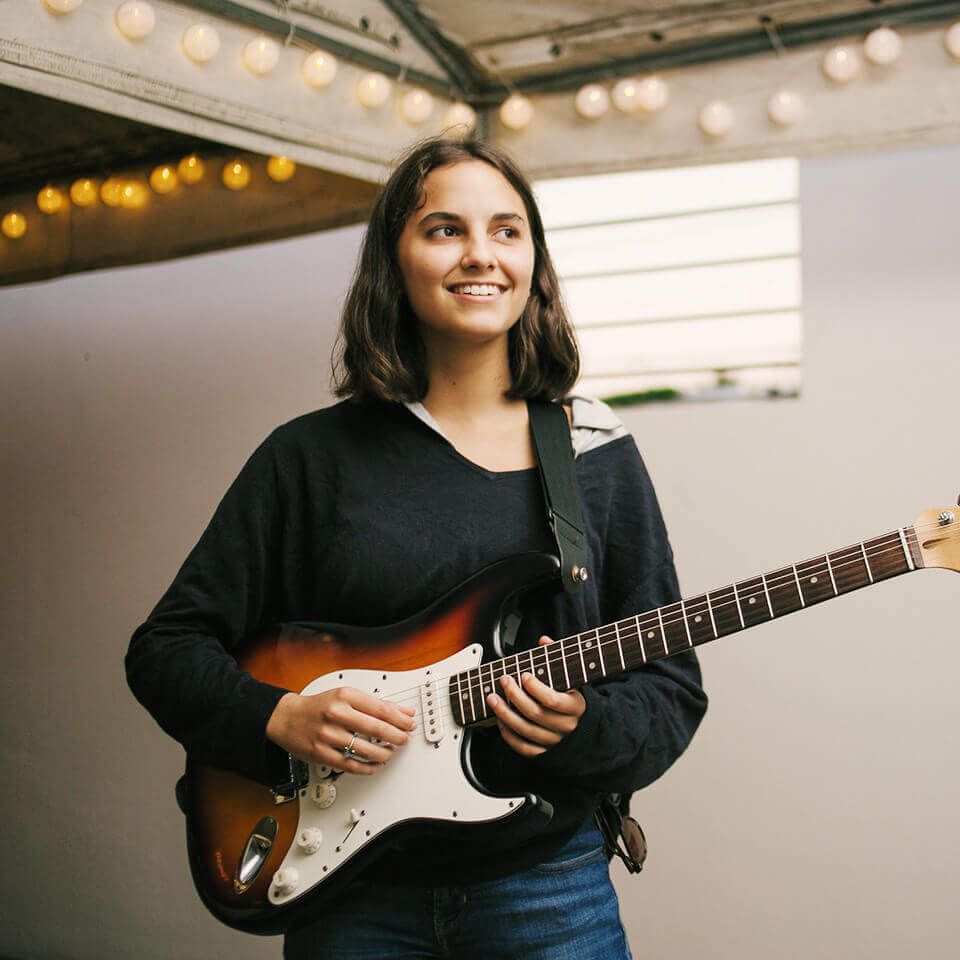 Girl playing guitar